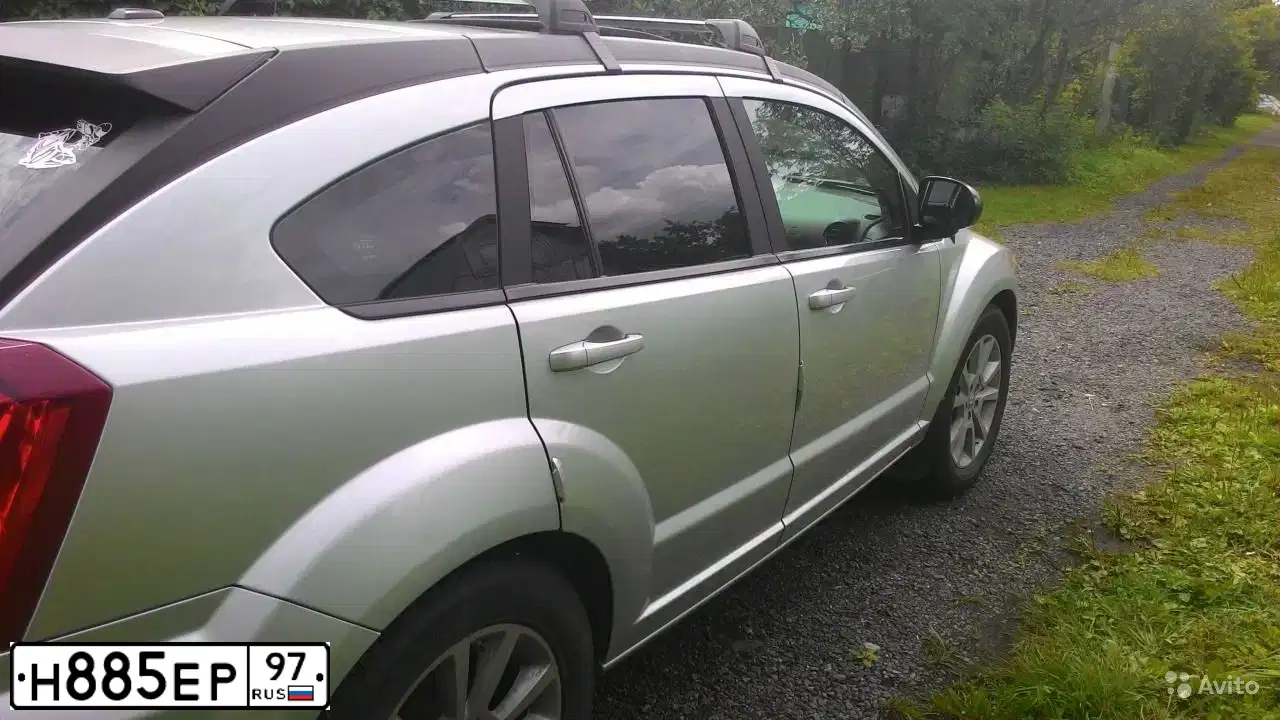 Фото автомобиля VOLKSWAGEN TIGUAN, 2012 — госномер М003ЕР750. Цвет: БЕЛЫЙ