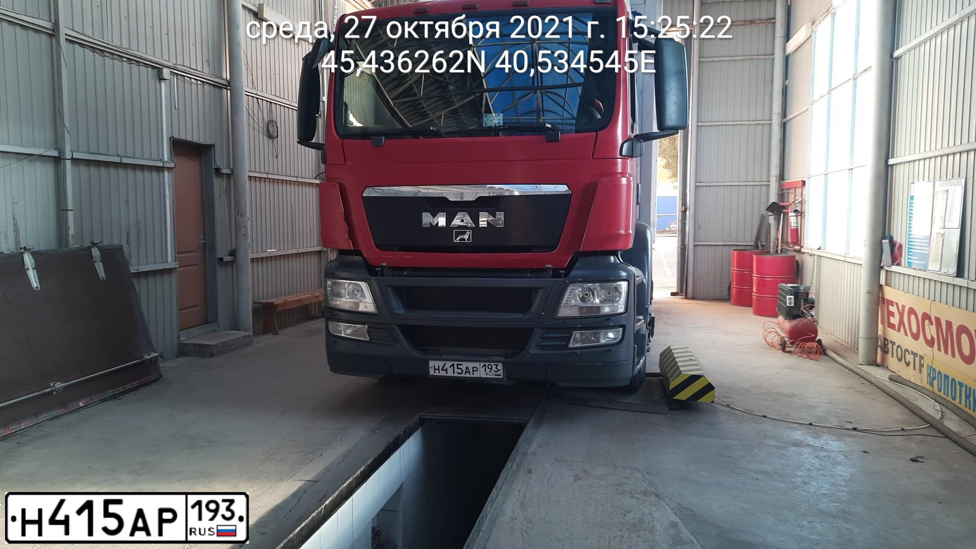 Фото автомобиля MAN TGS, 2011 — госномер М129РХ67. Цвет: КРАСНО-БЕЛЫЙ