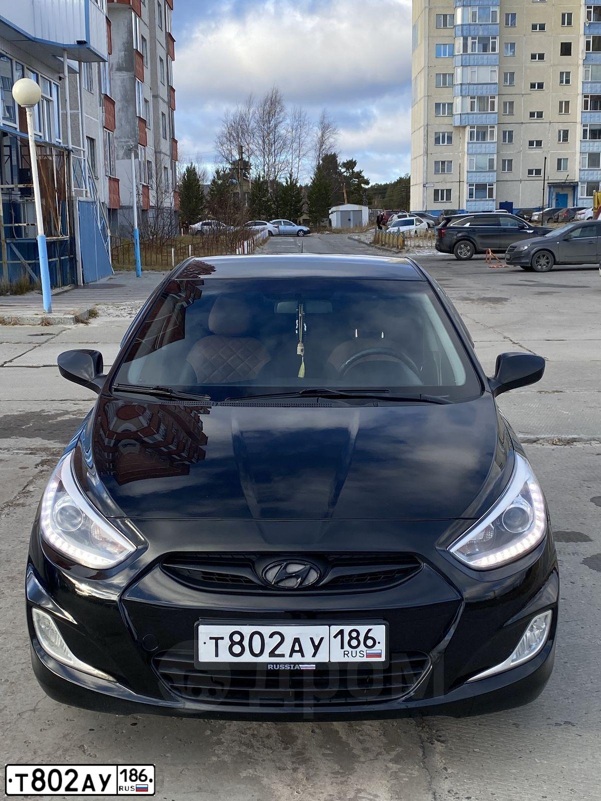 Фото автомобиля HYUNDAI SOLARIS, 2014 — госномер Н750ВТ702. Цвет: ЧЕРНЫЙ