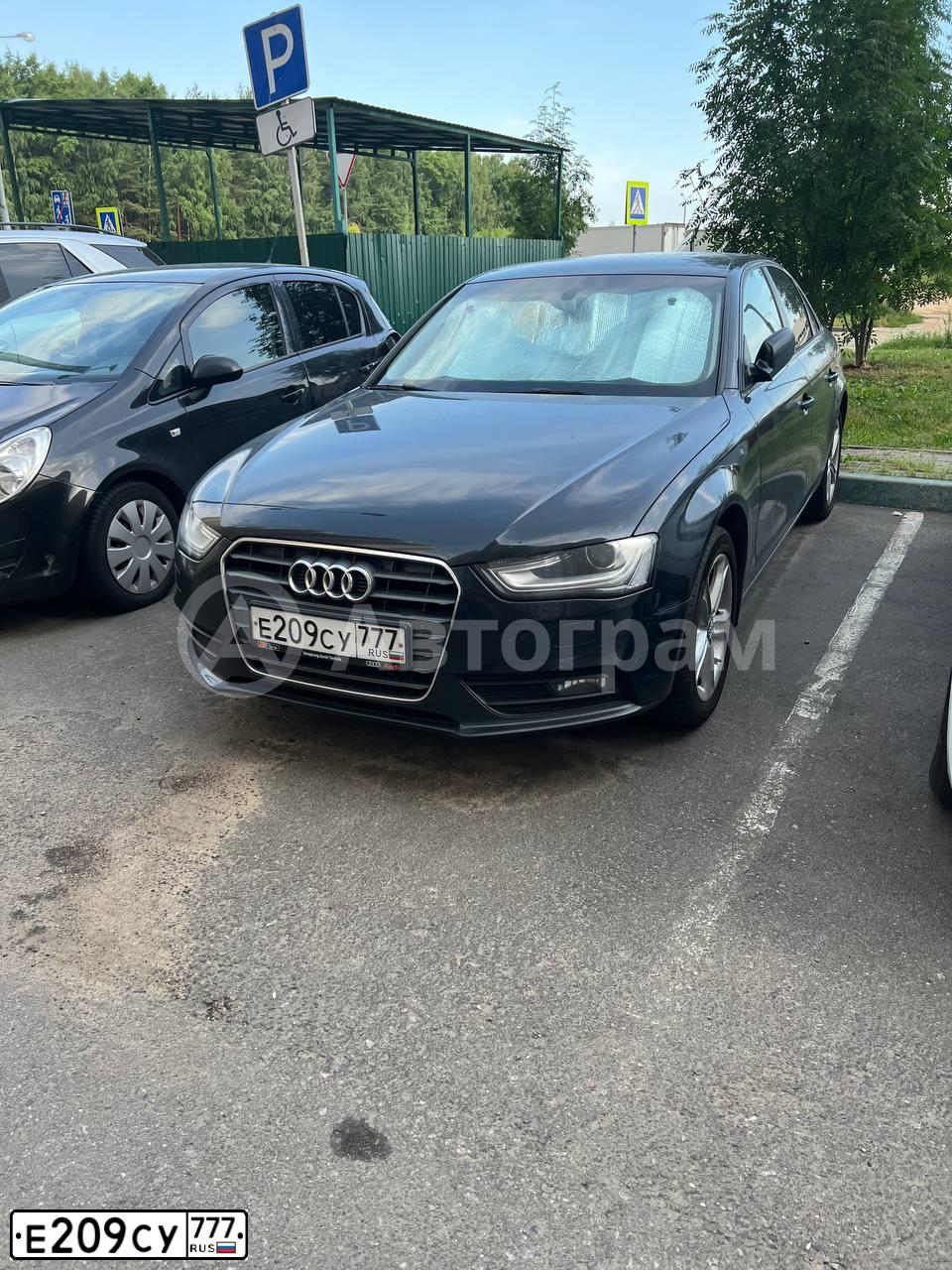 Фото автомобиля AUDI A4, 2014 — госномер Е209СУ777. Цвет: ЧЕРНЫЙ