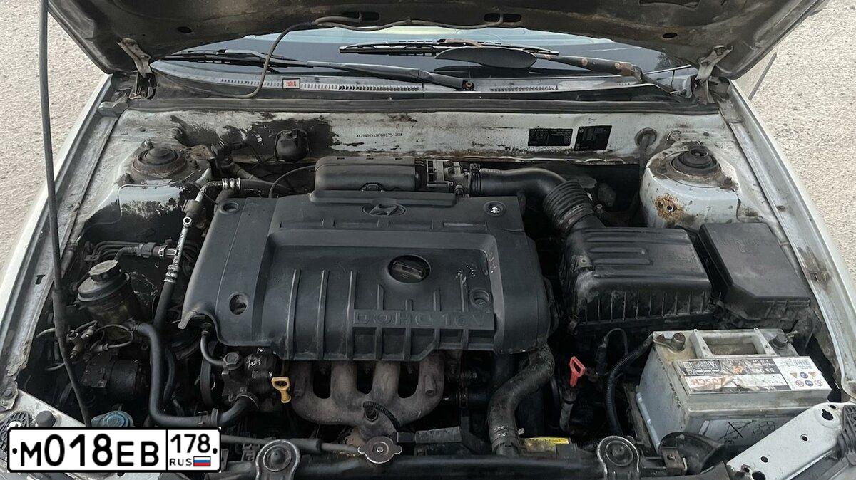 Фото автомобиля HYUNDAI ELANTRA, 2005 — госномер Н042МК198. Цвет: Серебристый