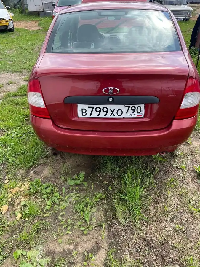Фото автомобиля LADA KALINA, 2006 — госномер М377АР250. Цвет: СЕРЕБРИСТО-КРАСНЫЙ