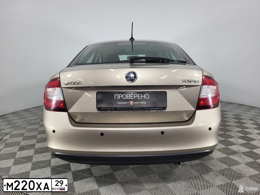 Фото автомобиля SKODA A RAPID, 2019 — госномер Н893КО21. Цвет: БЕЖЕВЫЙ