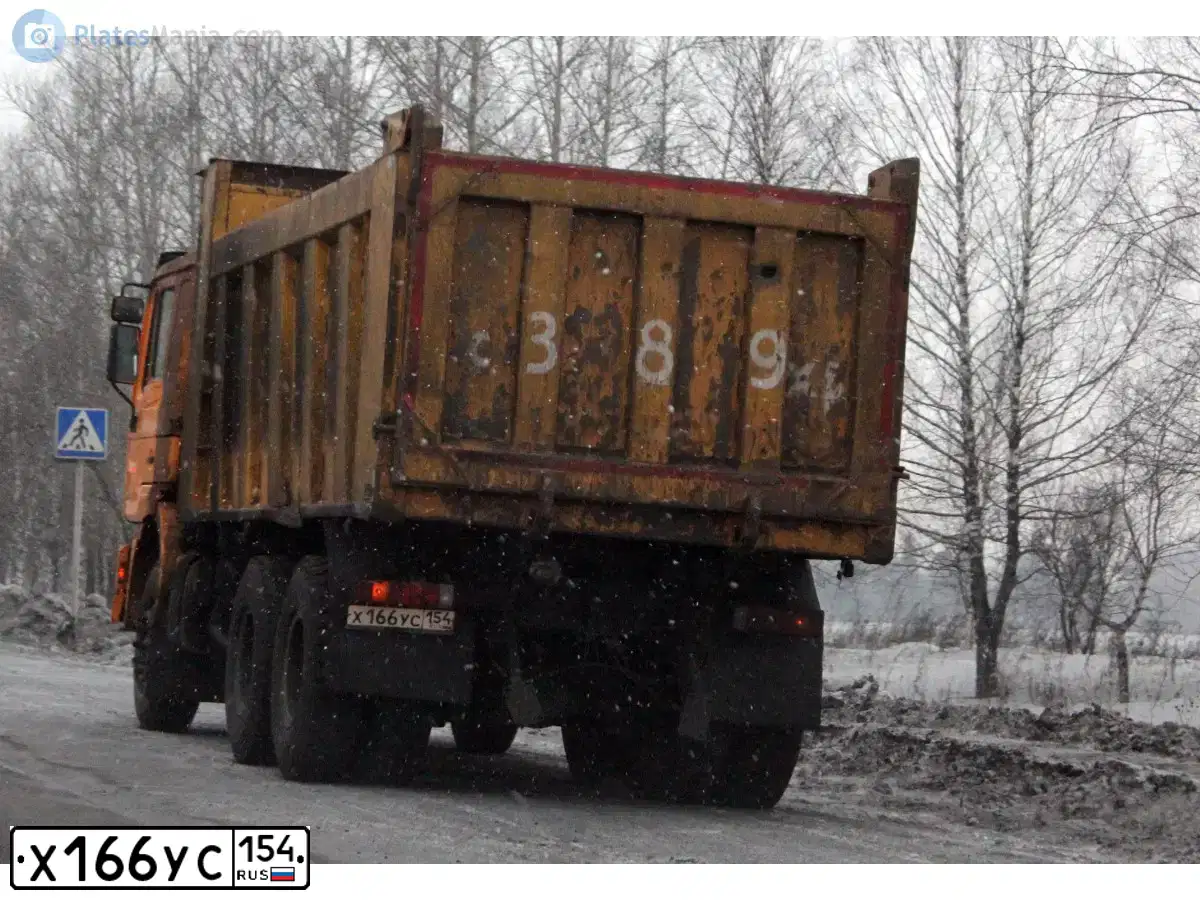 Фото автомобиля SHAANXI SX 325 /6X4/, 2013 — госномер Х166УС154. Цвет: ЖЕЛТЫЙ