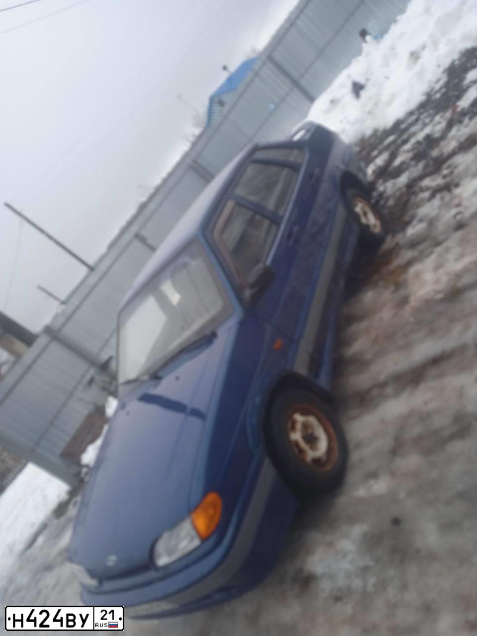 Фото автомобиля LADA 2115 SAMARA, 2003 — госномер Н424ВУ21. Цвет: СЕРЕБРИСТО-ЯРКО-СИНИЙ