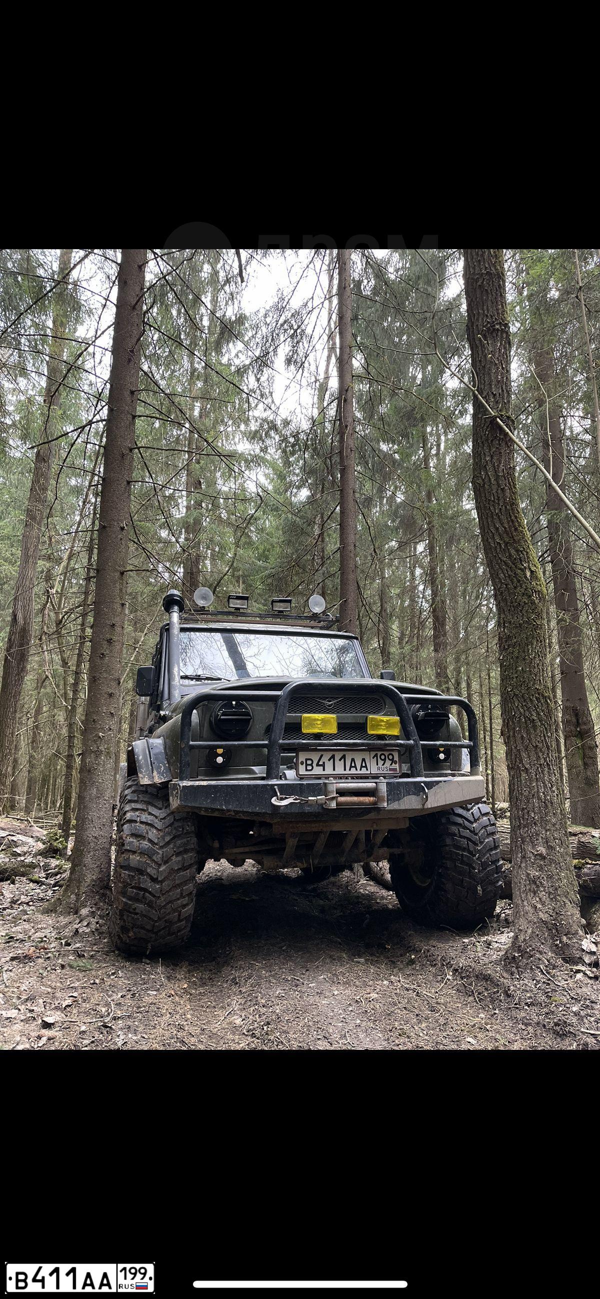 Фото автомобиля UAZ 3151 / HUNTER, 2007 — госномер В411АА199. Цвет: ЗЕЛЕНЫЙ