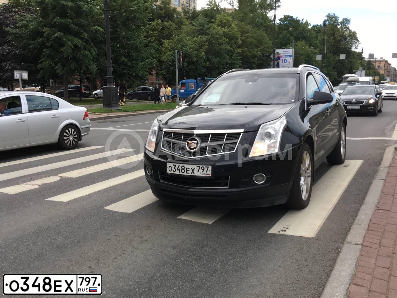 Фото автомобиля CADILLAC SRX, 2010 — госномер К491УА797. Цвет: ЧЕРНЫЙ