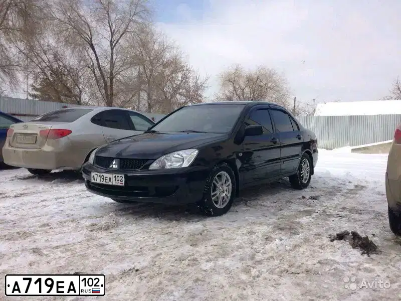 Фото автомобиля MITSUBISHI LANCER, 2006 — госномер Е683СС763. Цвет: ЧЕРНЫЙ