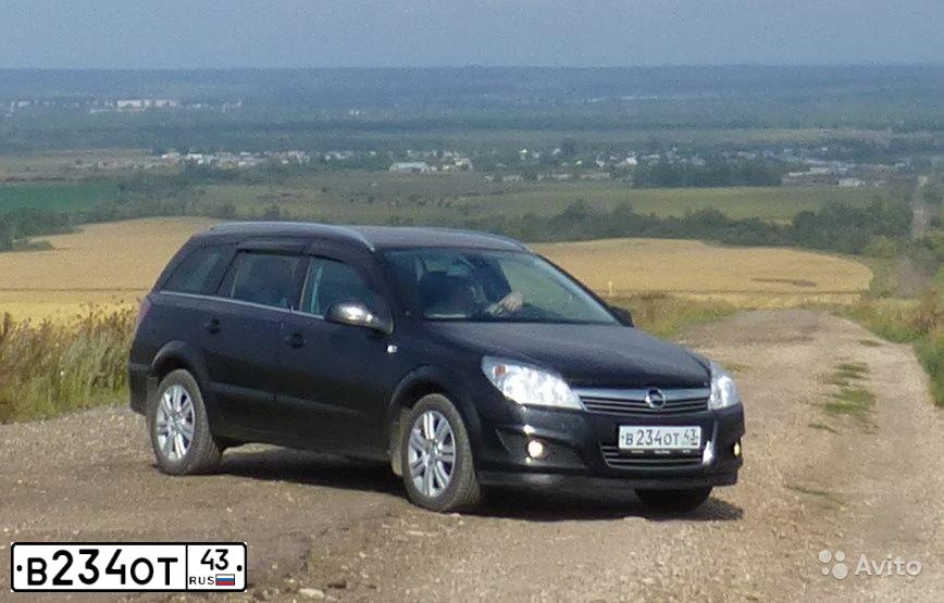 Фото автомобиля OPEL ASTRA, 2011 — госномер В234ОТ43. Цвет: ЧЕРНЫЙ
