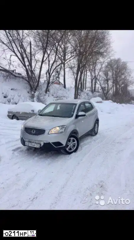Фото автомобиля SSANGYONG ACTYON, 2012 — госномер О211НР11. Цвет: Серебристый