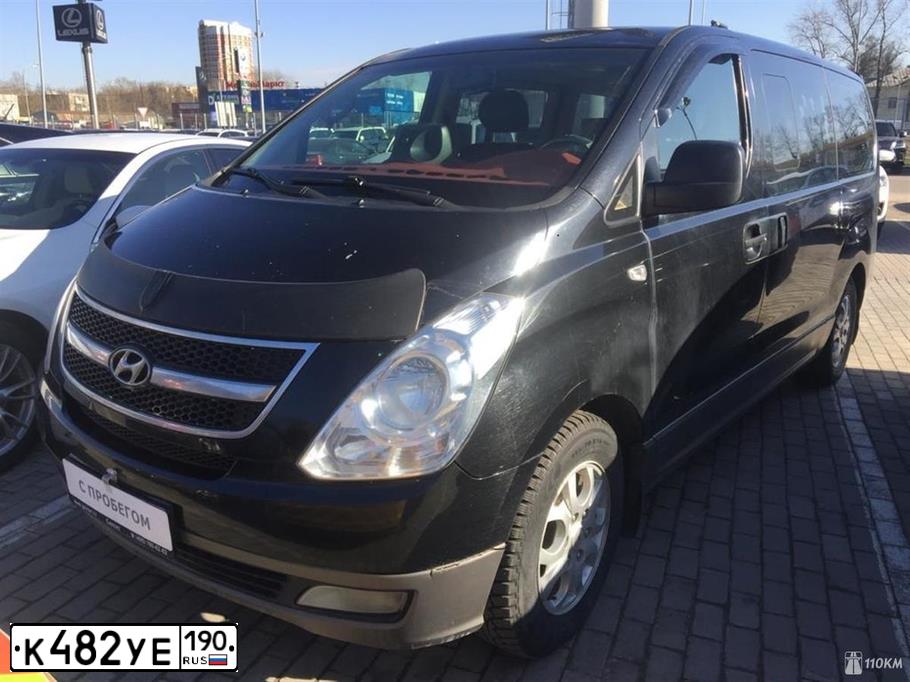 Фото автомобиля HYUNDAI GRAND STAREX, 2010 — госномер К482УЕ190. Цвет: ЧЕРНЫЙ СЕРЫЙ