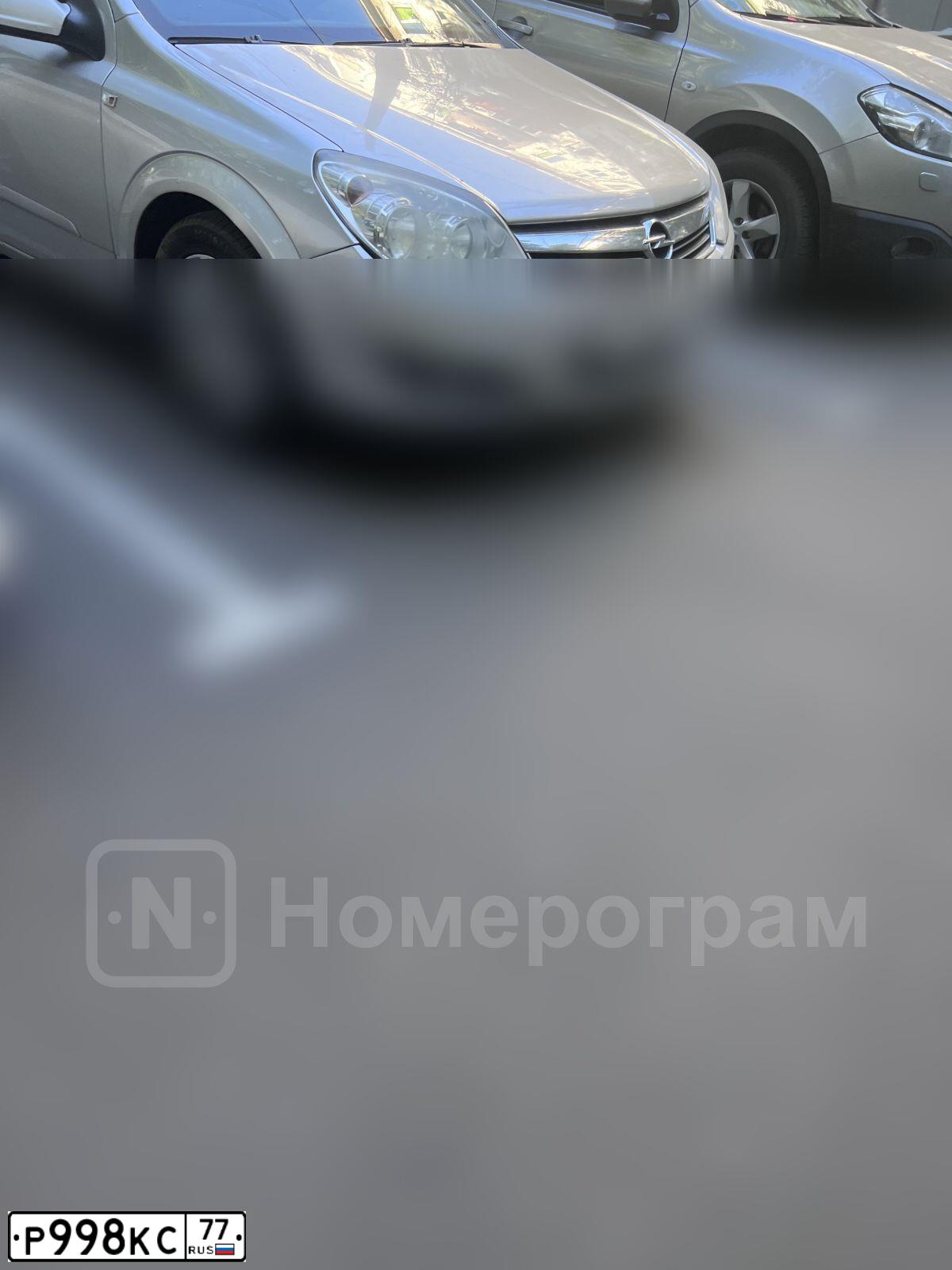 Фото автомобиля OPEL ASTRA, 2007 — госномер Р998КС77. Цвет: СЕРЫЙ