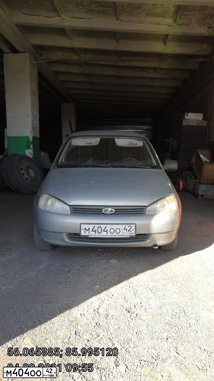 Фото автомобиля LADA 1119 KALINA, 2007 — госномер Т709НЕ142. Цвет: БЕЖЕВО - СЕРЫЙ