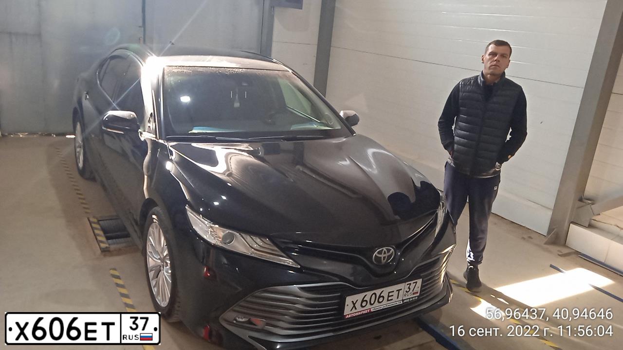 Фото автомобиля TOYOTA CAMRY, 2018 — госномер Х606ЕТ37. Цвет: ЧЕРНЫЙ МЕТАЛЛИК