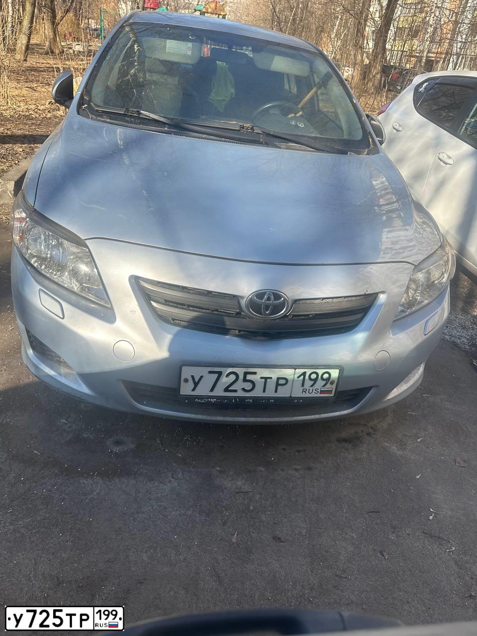 Фото автомобиля TOYOTA COROLLA, 2007 — госномер У725ТР199. Цвет: СВЕТЛО-ГОЛУБОЙ