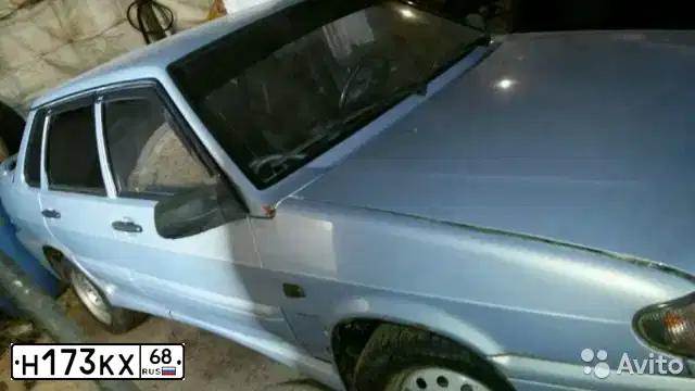 Фото автомобиля ВАЗ 21150, 2005 — госномер Е636МЕ136. Цвет: Серебристо-желто-голубой