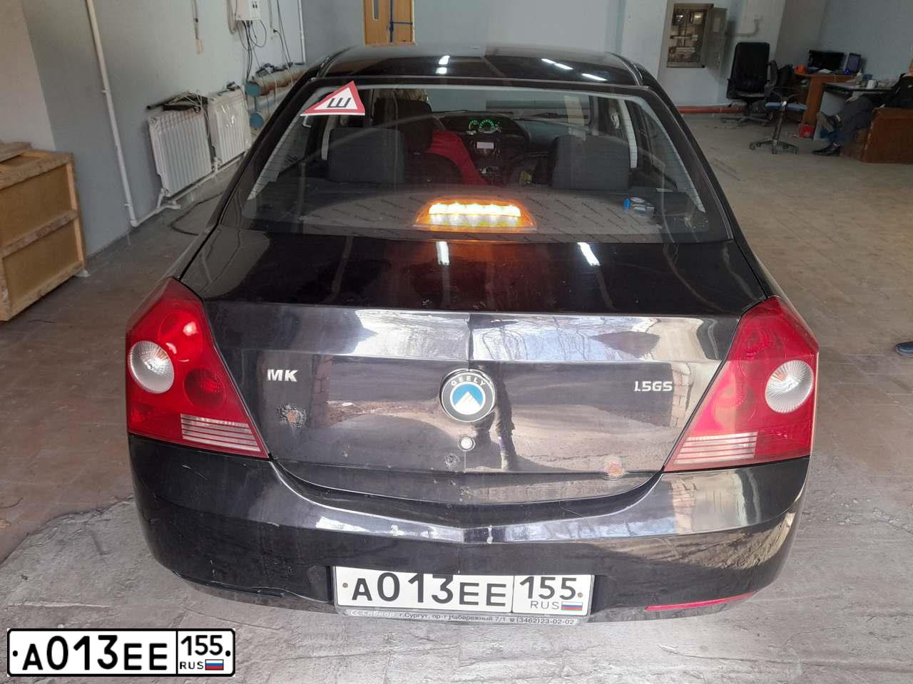 Фото автомобиля GEELY MK, 2008 — госномер А013ЕЕ155. Цвет: ЧЕРНЫЙ