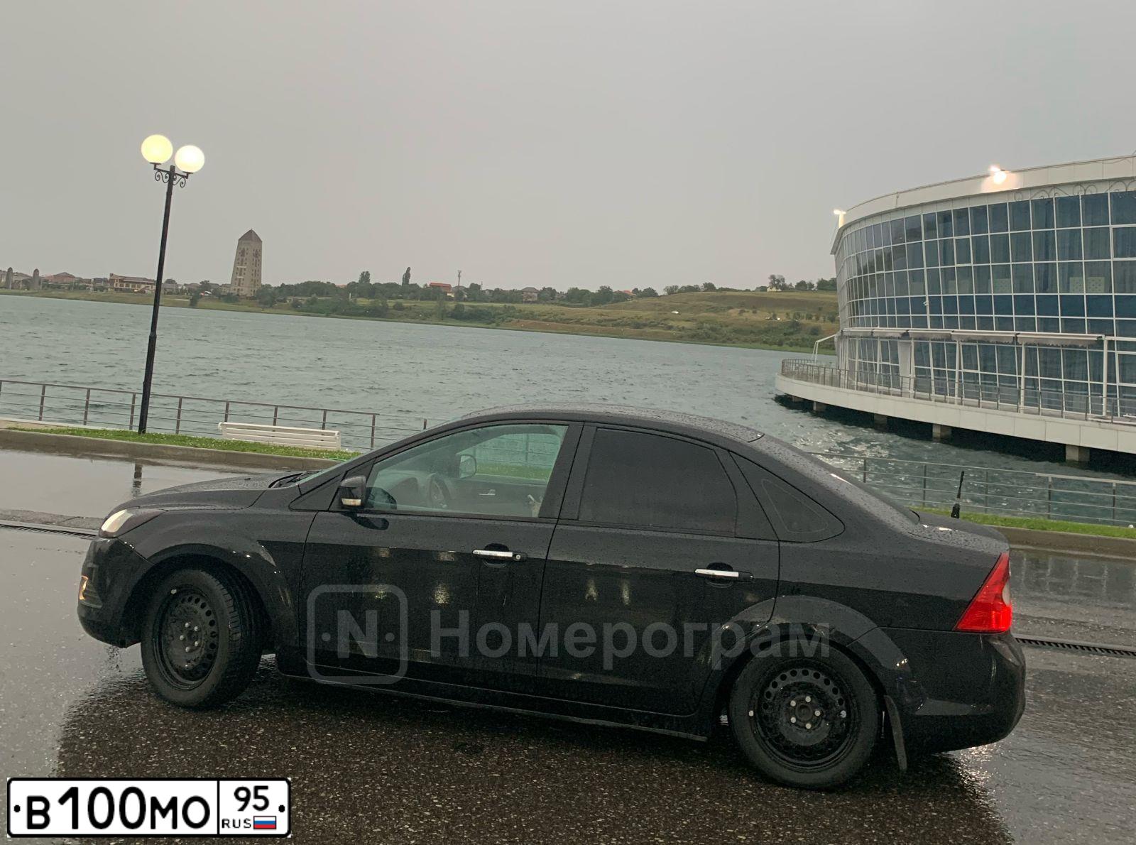 Фото автомобиля FORD FOCUS, 2009 — госномер В100МО95. Цвет: ЧЕРНЫЙ