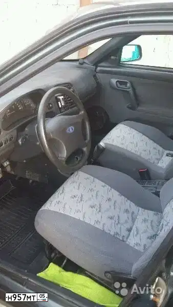 Фото автомобиля LADA 2112, 2006 — госномер Х182УА05. Цвет: СЕРО-СИНЕ-ЗЕЛЕНЫЙ