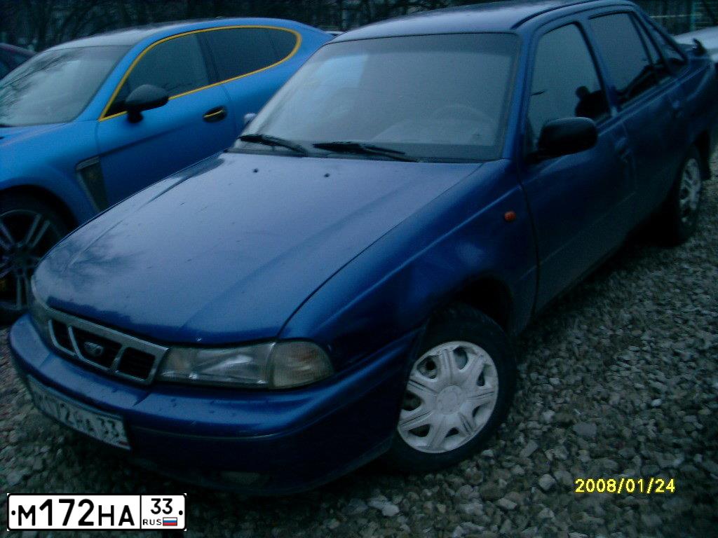 Фото автомобиля DAEWOO NEXIA, 1996 — госномер В180МО77. Цвет: СИНИЙ