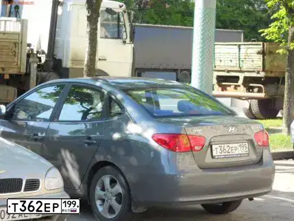 Фото автомобиля HYUNDAI ELANTRA, 2008 — госномер Н682ОВ777. Цвет: СЕРЫЙ