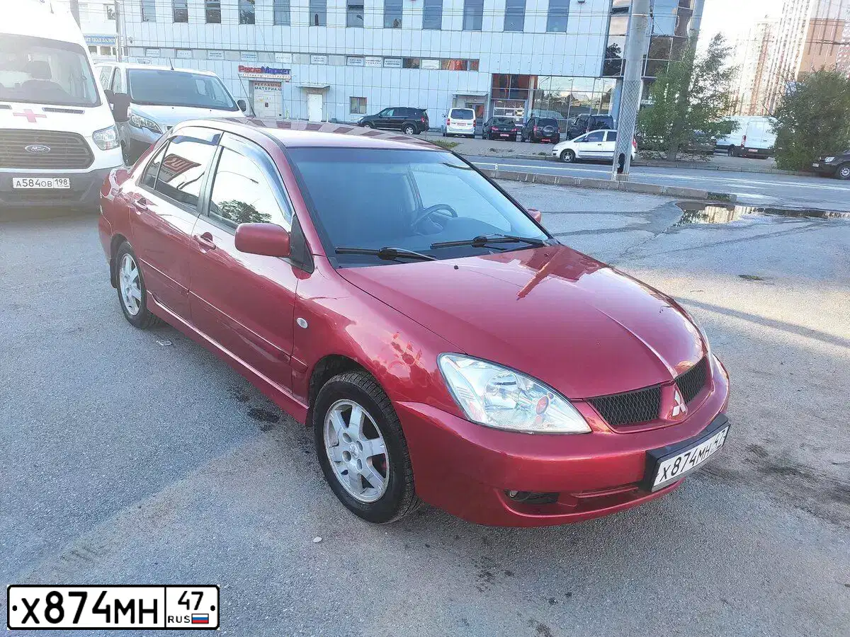 Фото автомобиля MITSUBISHI LANCER, 2006 — госномер О418ОК193. Цвет: Красный