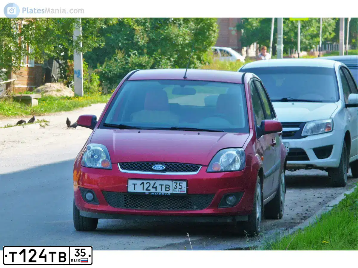 Фото автомобиля FORD FIESTA / ASPIRE, 2007 — госномер Т124ТВ35. Цвет: ТЕМНО-КРАСНЫЙ