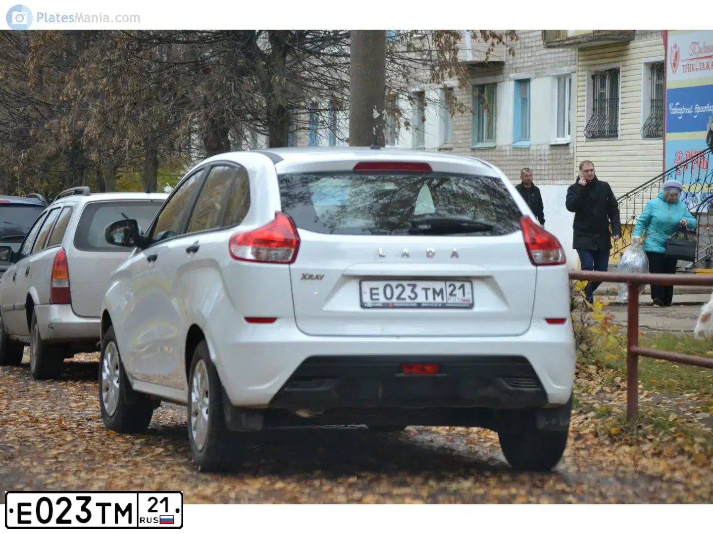 Фото автомобиля LADA XRAY, 2017 — госномер Е023ТМ21. Цвет: БЕЛЫЙ