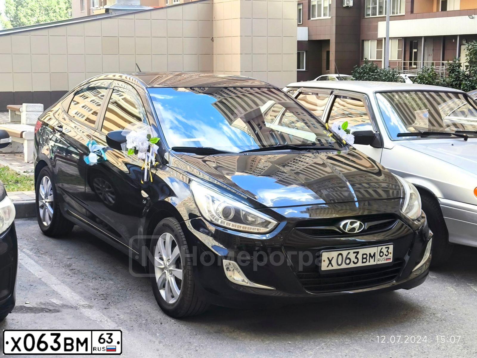 Фото автомобиля LADA 2109 SAMARA, 2001 — госномер Х063ВМ63. Цвет: СЕРЕБРИСТО-СЕРО-ЗЕЛЕНЫЙ