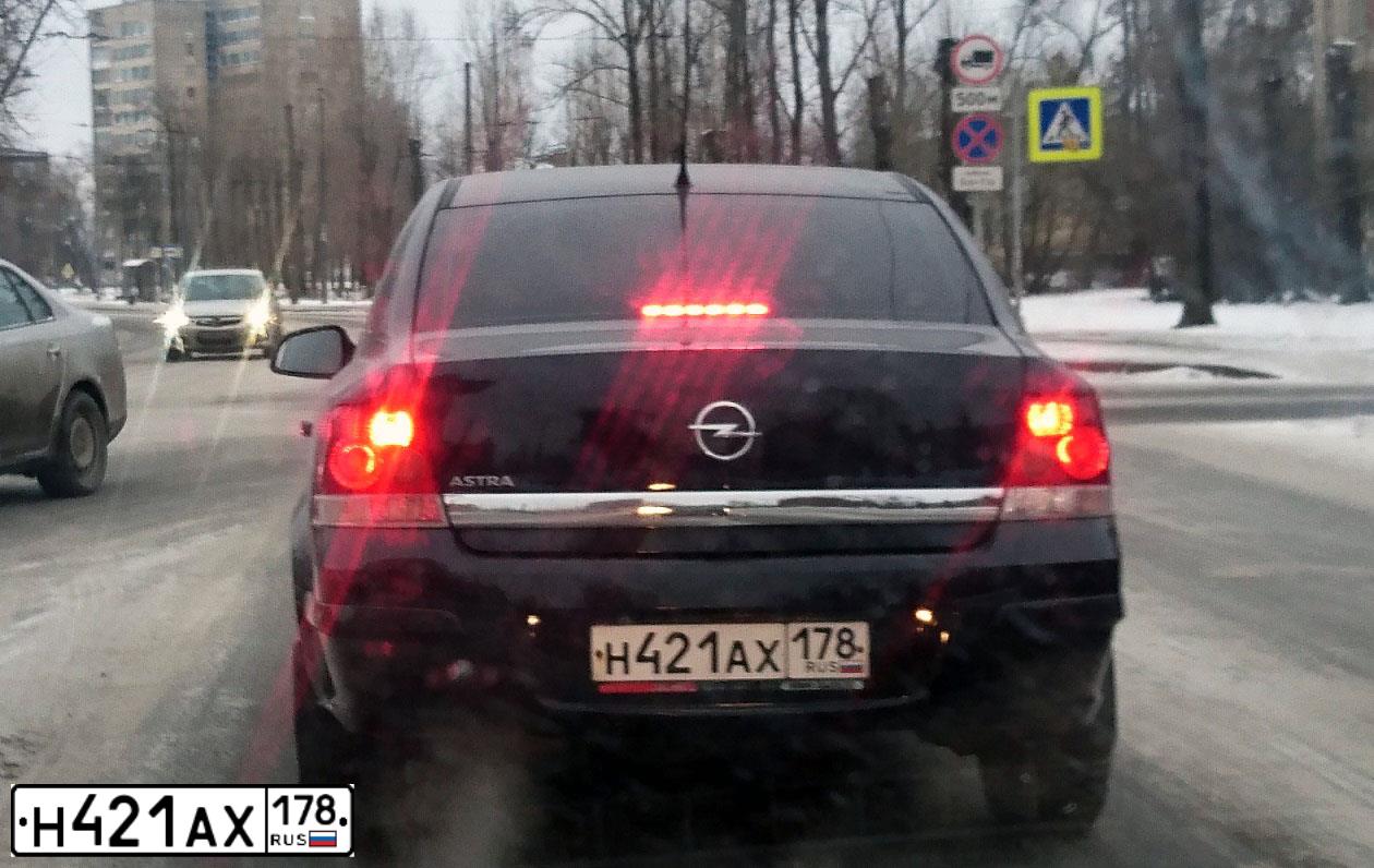 Фото автомобиля OPEL ASTRA, 2010 — госномер Е650СР76. Цвет: ЧЕРНЫЙ