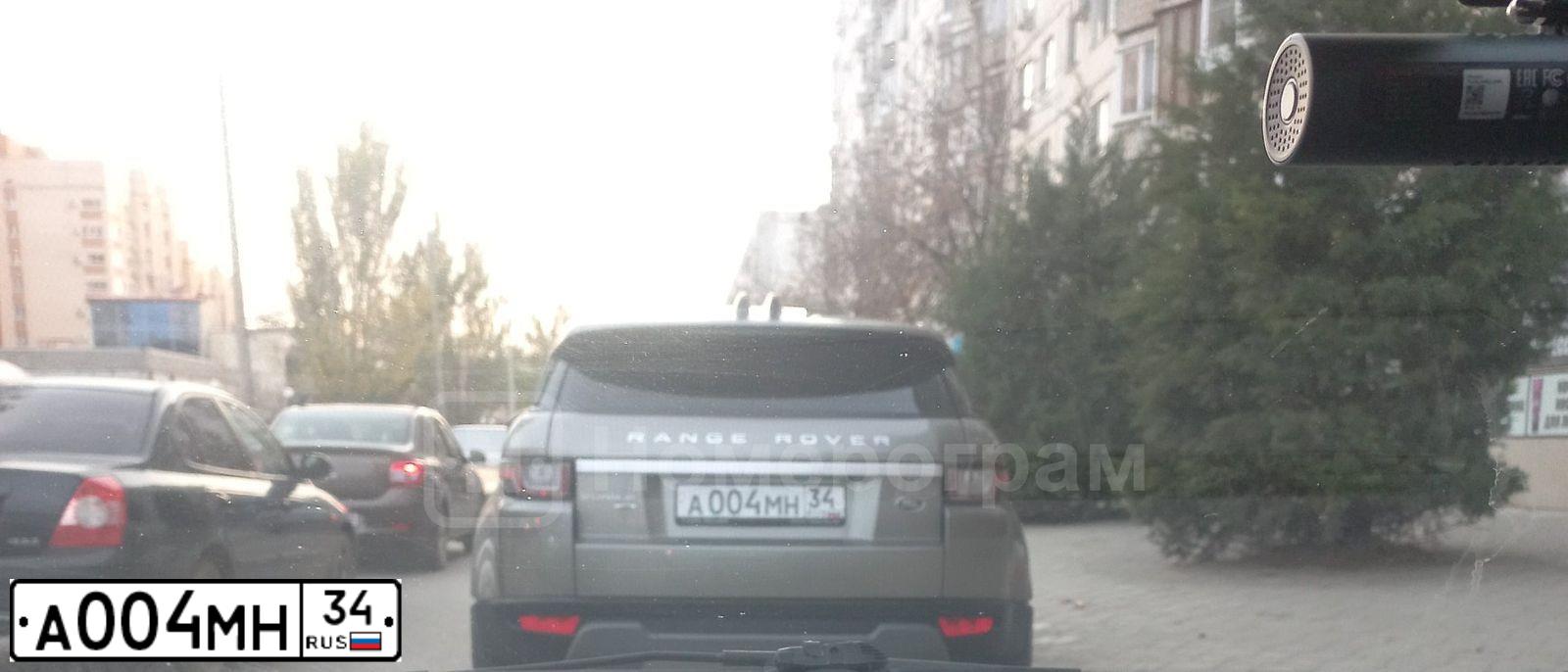 Фото автомобиля SUBARU FORESTER, 2008 — госномер Е146ВВ134. Цвет: ЗЕЛЕНЫЙ