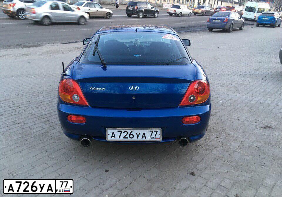 Фото автомобиля HYUNDAI TIBURON, 2003 — госномер С293ОХ761. Цвет: синий