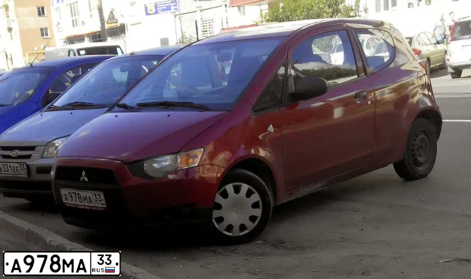 Фото автомобиля MITSUBISHI COLT, 2009 — госномер А978МА33. Цвет: КРАСНЫЙ