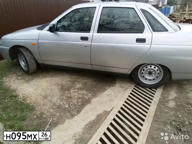 Фото автомобиля NISSAN X-TRAIL, 2004 — госномер Н535ЕВ29. Цвет: ТЕМНО-КРАСНЫЙ