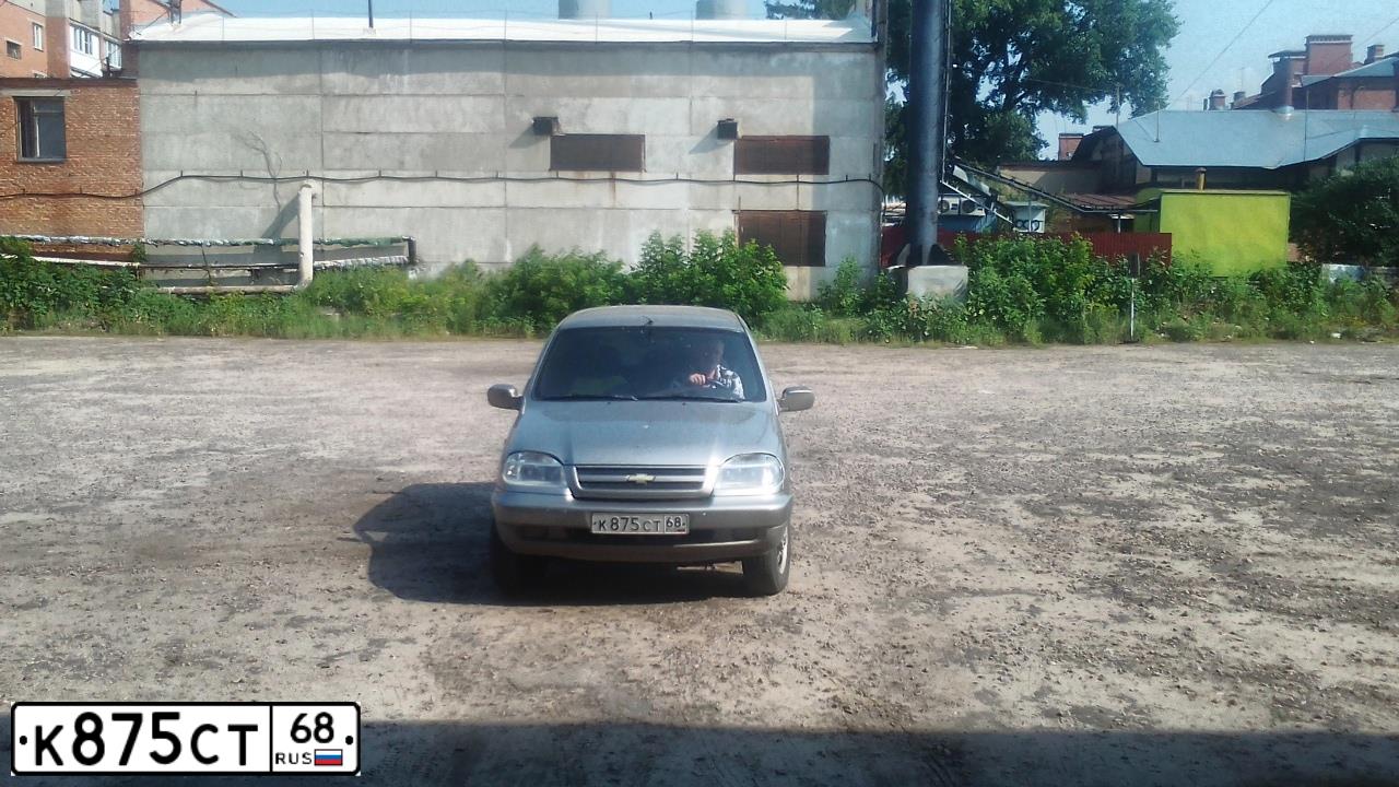 Фото автомобиля CHEVROLET NIVA, 2008 — госномер К875СТ68. Цвет: СЕРО-КОРИЧНЕВЫЙ МЕТАЛЛИК