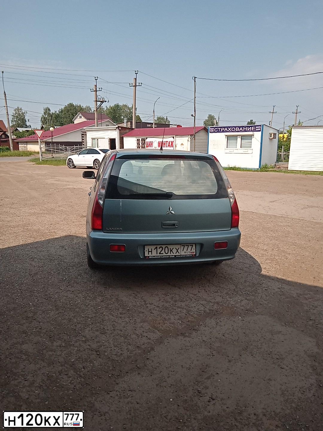 Фото автомобиля MITSUBISHI LANCER, 2006 — госномер С190НТ190. Цвет: СЕРО-ЗЕЛЕНЫЙ