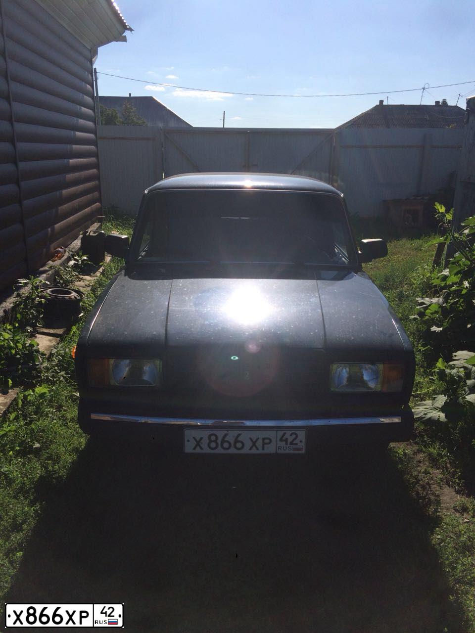Фото автомобиля LADA 2107, 2009 — госномер Х866ХР42. Цвет: ТЕМНО ЗЕЛЕНЫЙ