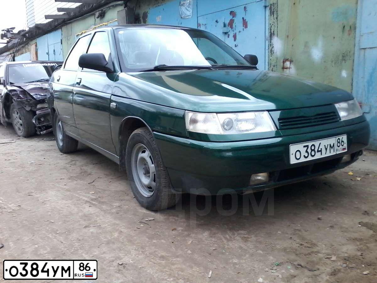 Фото автомобиля LADA 2110 LADA, 2003 — госномер С431МО70. Цвет: Темно-зеленый