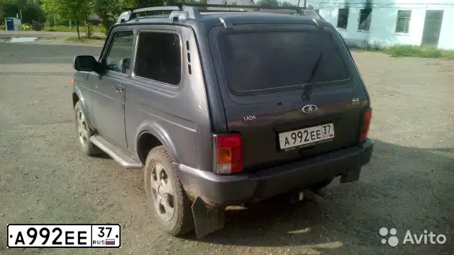 Фото автомобиля LADA 2121 NIVA, 2015 — госномер А992ЕЕ37. Цвет: серебристо-темно-серый