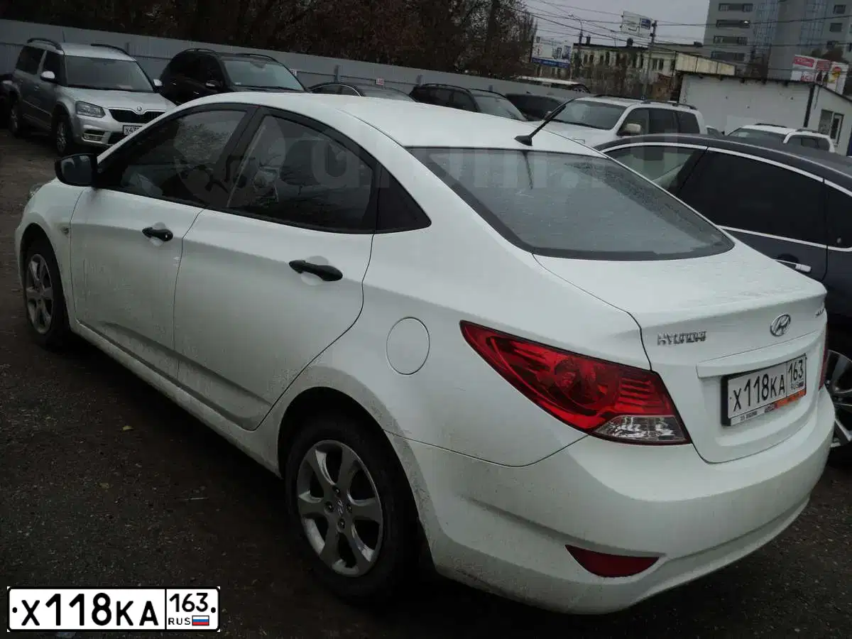 Фото автомобиля HYUNDAI SOLARIS, 2014 — госномер Х118КА163. Цвет: Белый