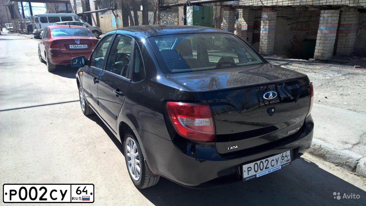 Фото автомобиля LADA 2190 GRANTA, 2014 — госномер Р002СУ64. Цвет: ЧЕРНЫЙ