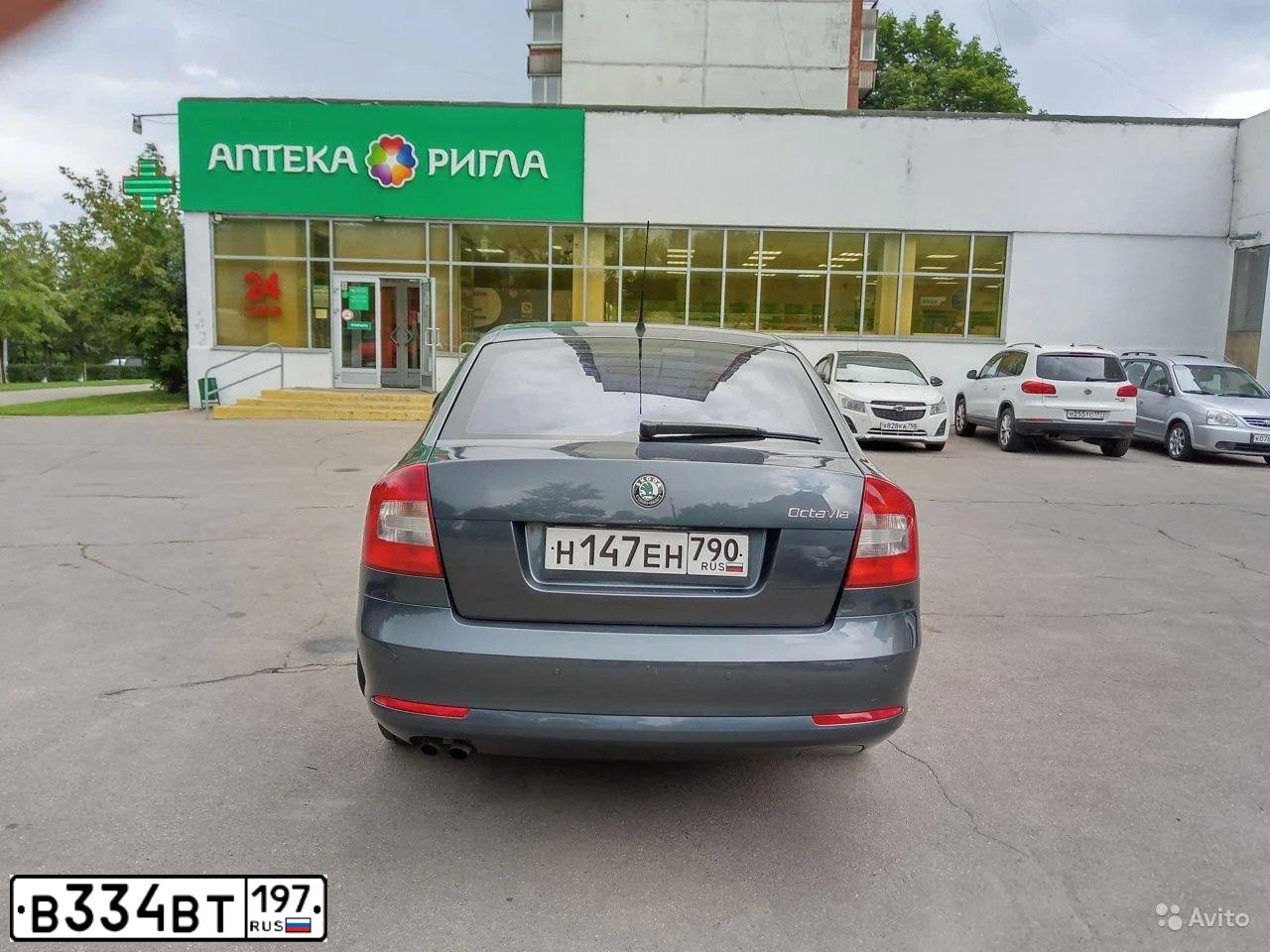 Фото автомобиля NISSAN TIIDA, 2010 — госномер Е570УМ763. Цвет: СЕРЫЙ
