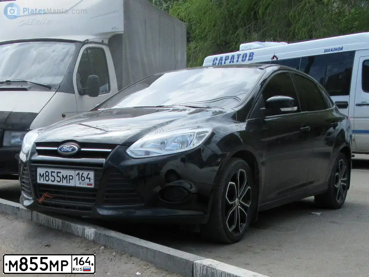 Фото автомобиля FORD FOCUS, 2012 — госномер М855МР164. Цвет: ЧЕРНЫЙ