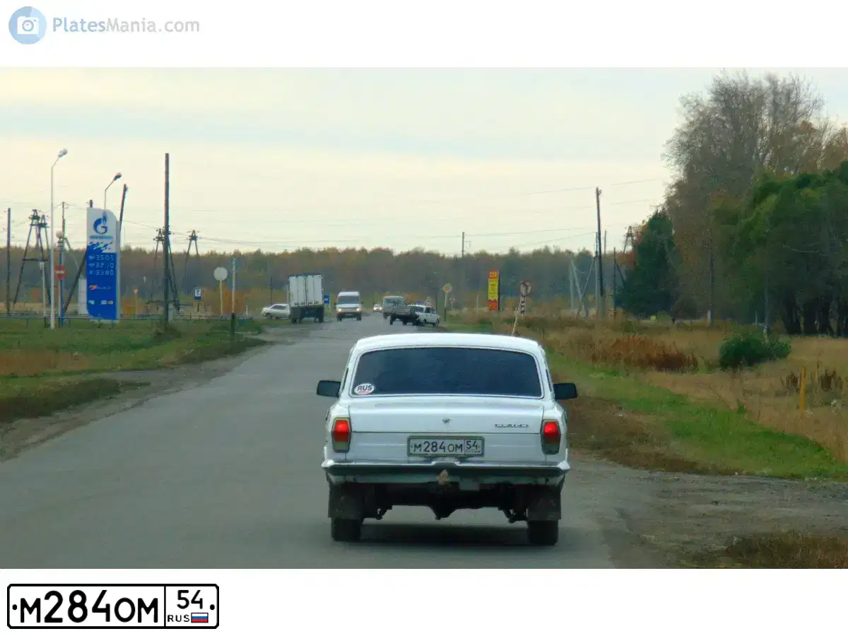 Фото автомобиля ГАЗ 2410, 1991 — госномер А754РН155. Цвет: БЕЛЫЙ