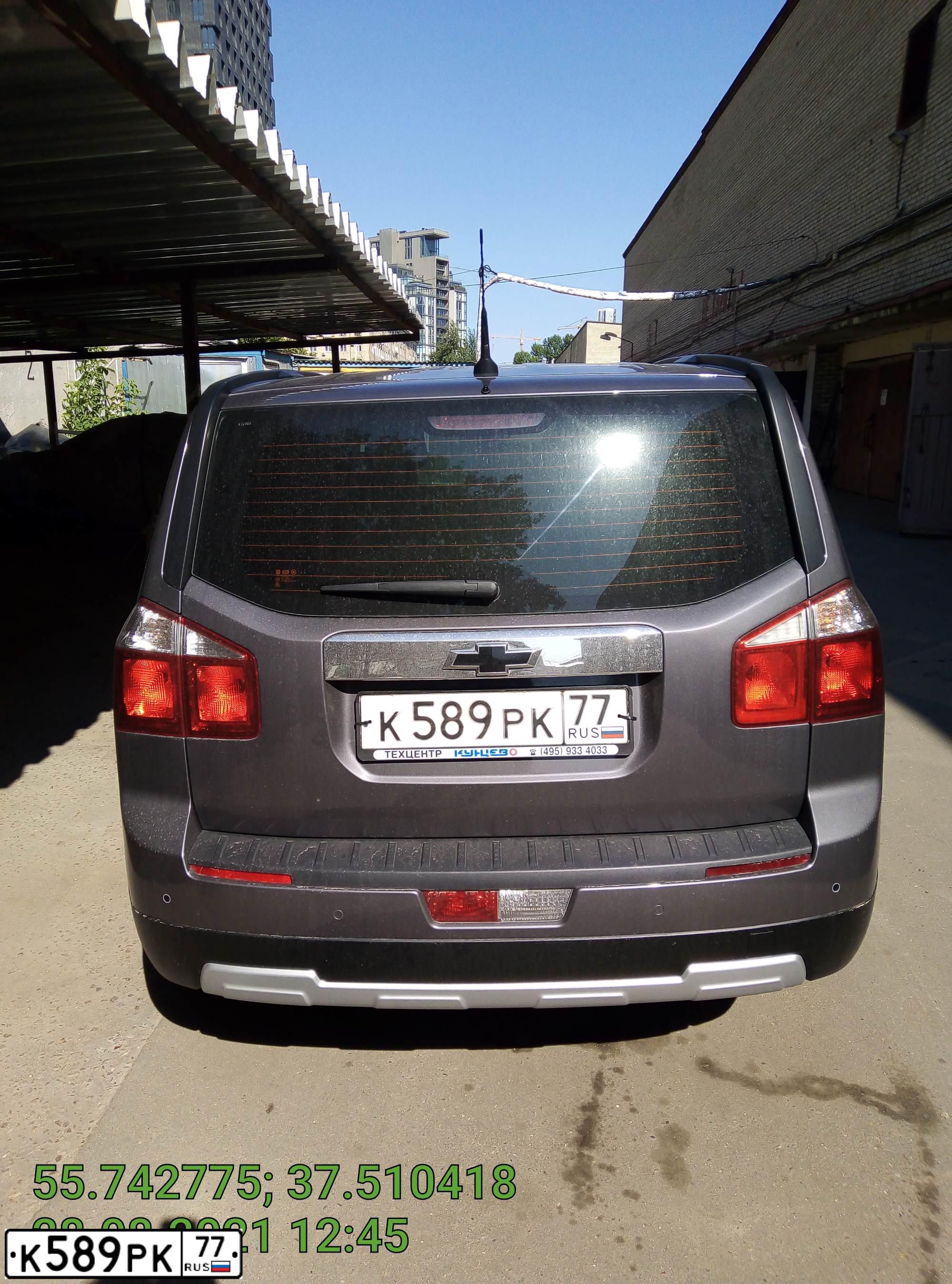 Фото автомобиля CHEVROLET ORLANDO, 2012 — госномер К589РК77. Цвет: СЕРЫЙ