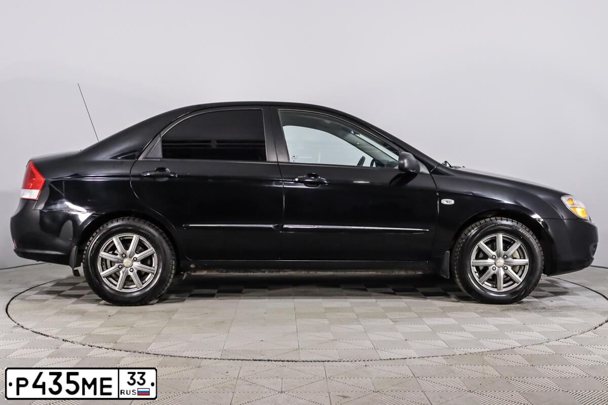 Фото автомобиля KIA CERATO, 2007 — госномер Н264СС198. Цвет: ЧЕРНЫЙ