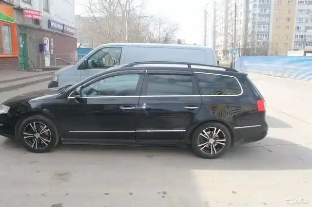 Фото автомобиля VOLKSWAGEN PASSAT, 2009 — госномер Т215АР152. Цвет: ЧЕРНЫЙ