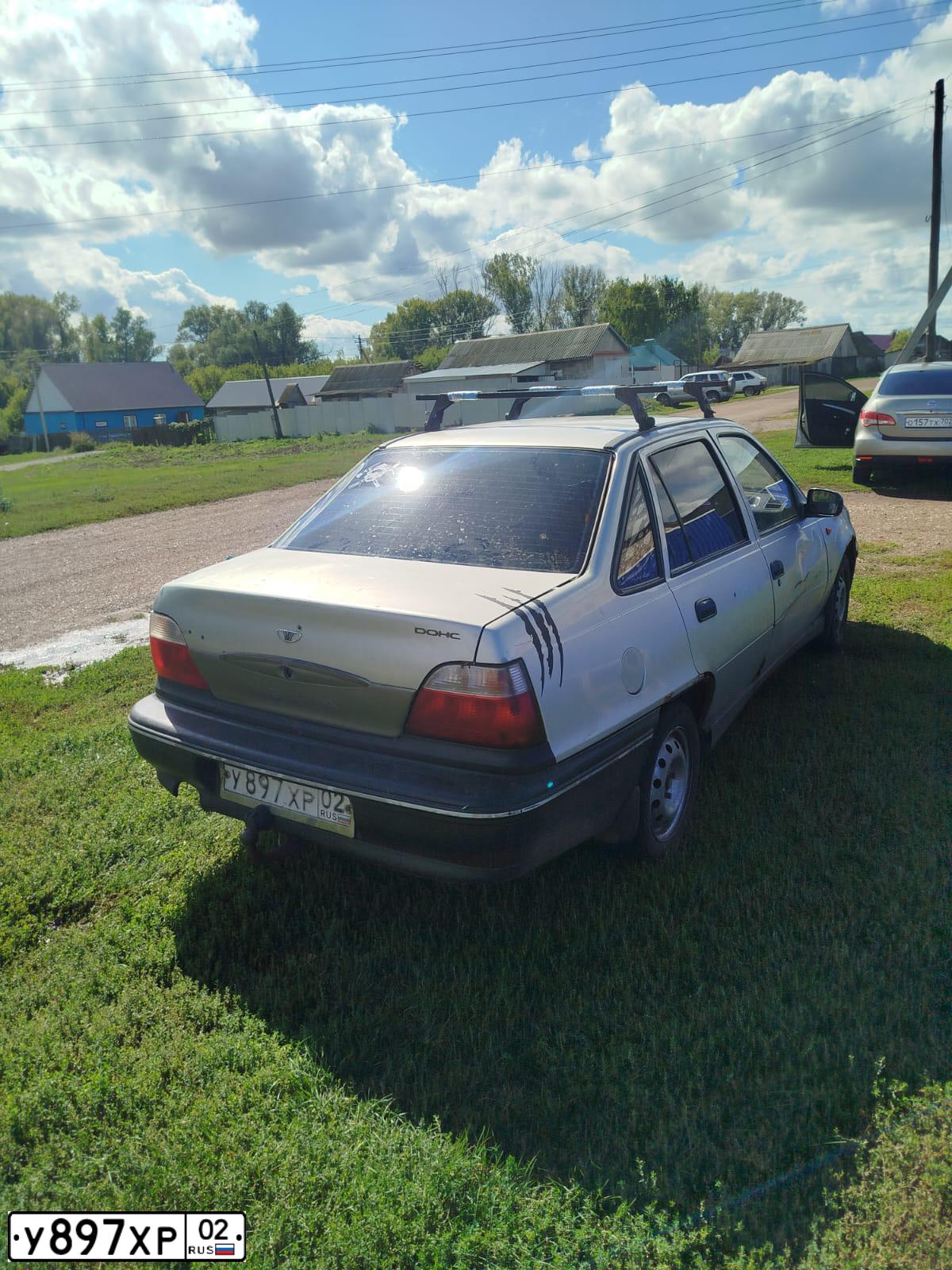 Фото автомобиля DAEWOO NEXIA, 2005 — госномер У897ХР02. Цвет: ПЕРЛАМУТРОВО-СЕРЕБРИСТЫЙ