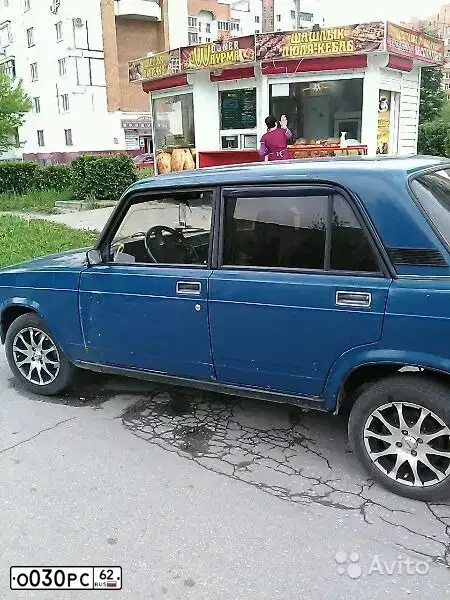 Фото автомобиля LADA 2121 NIVA, 2013 — госномер С030РС62. Цвет: Темно-зеленый