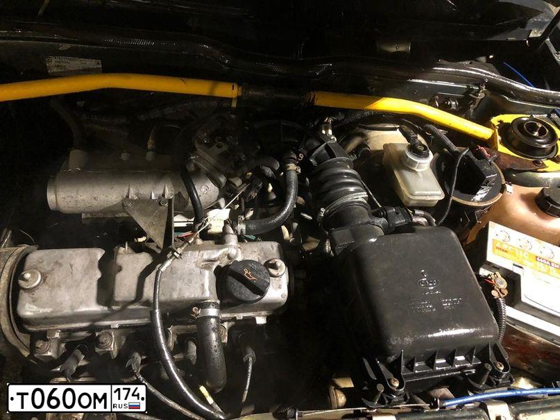 Фото автомобиля LADA 2114 SAMARA, 2006 — госномер Т060ОМ174. Цвет: Темно-зеленый